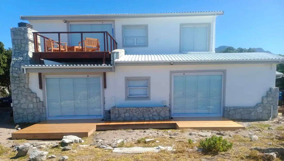 Timber deck at the front of a two storey house