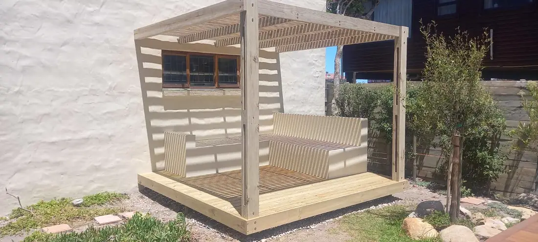 Finished pergola with built-in seating