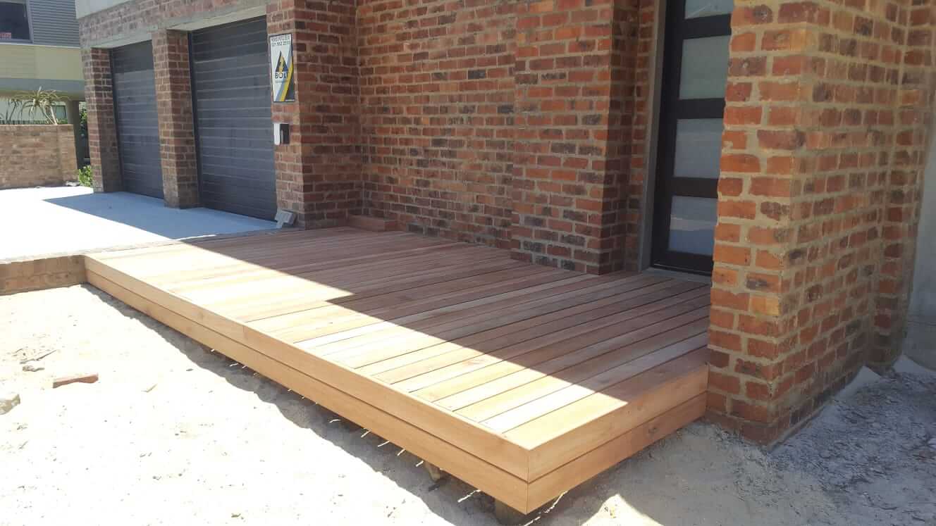 Raised deck, brick garage