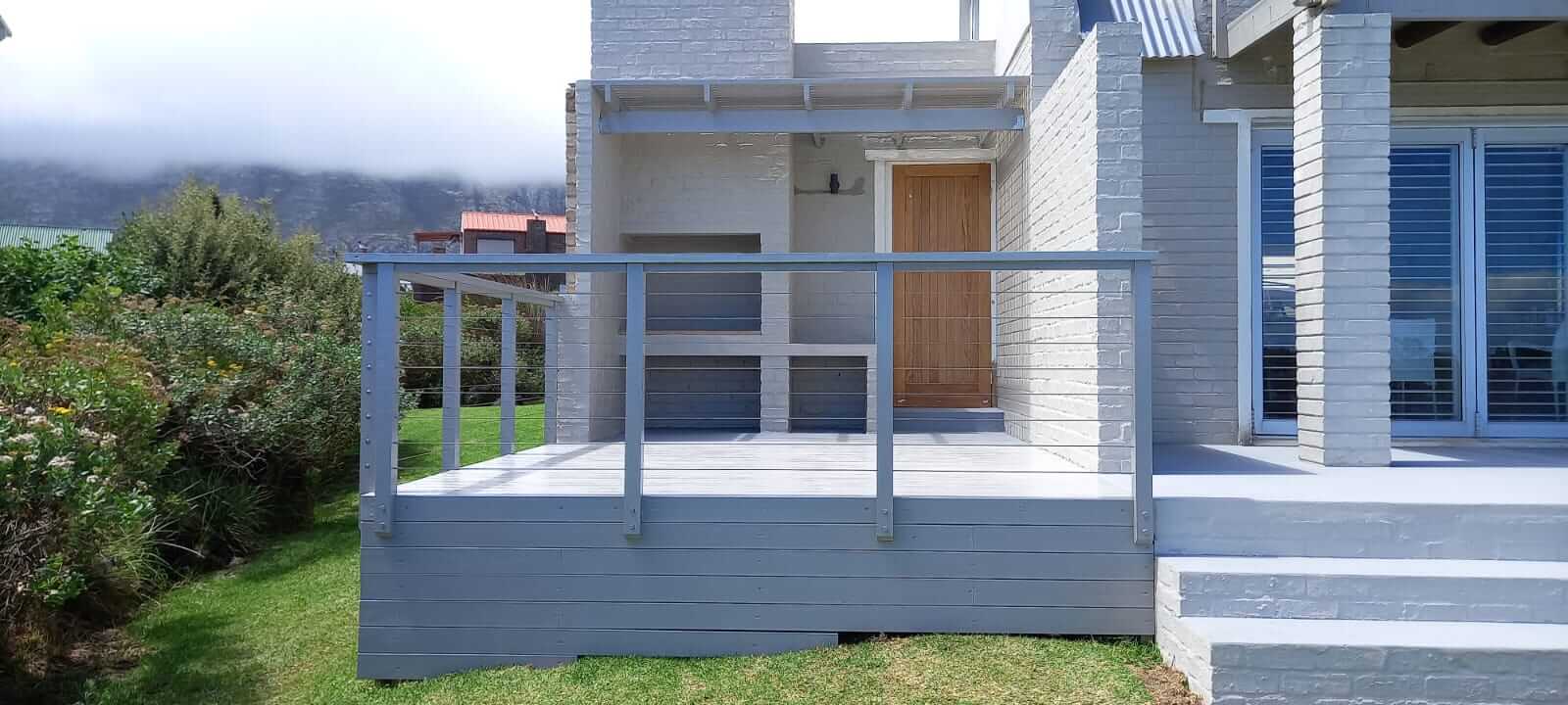 Grey-painted cable-rail deck