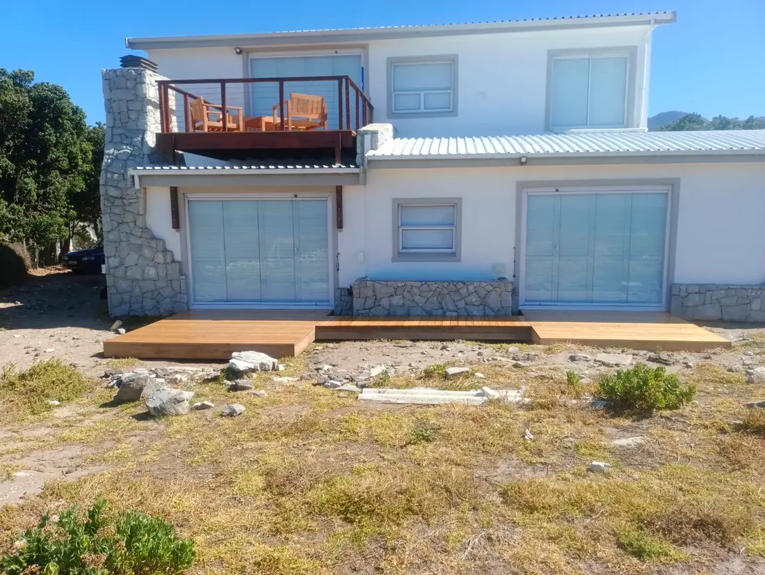Timber deck at the front of a two storey house