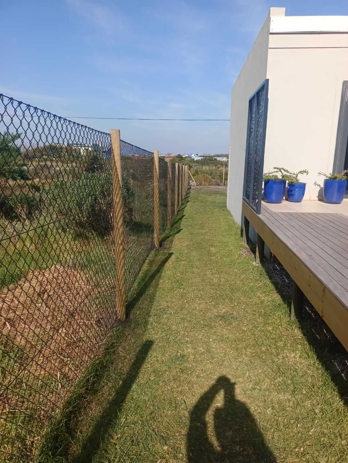 Chain-link boundary fence
