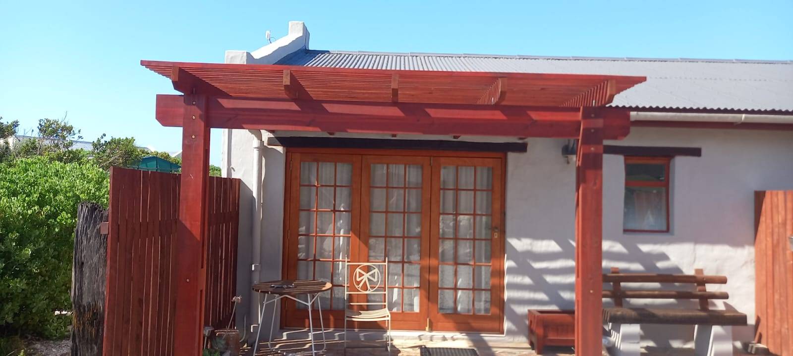 Pergola, French doors & bench