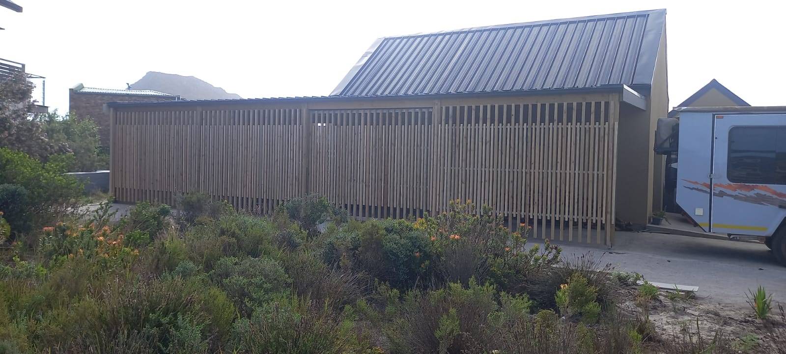 Slatted carport enclosure