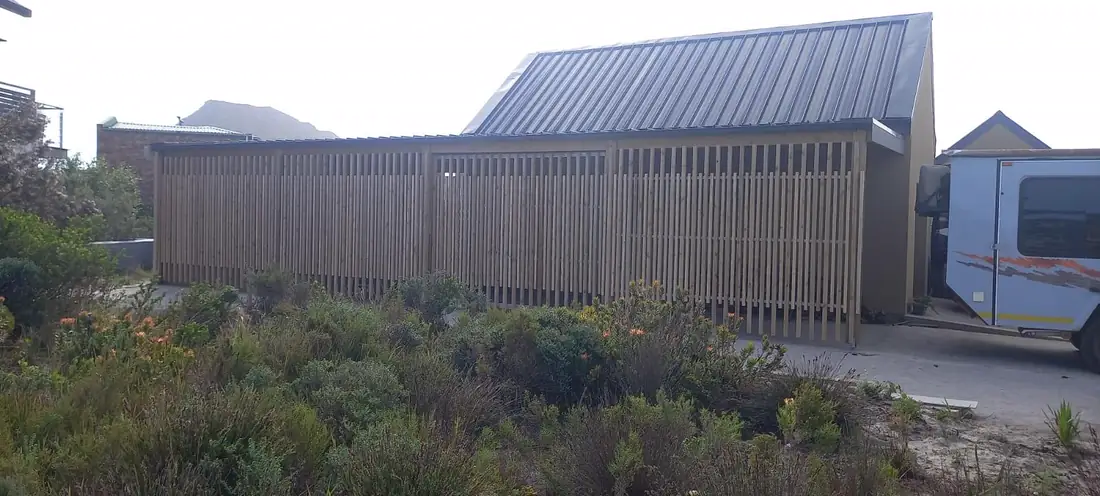 Slatted carport enclosure