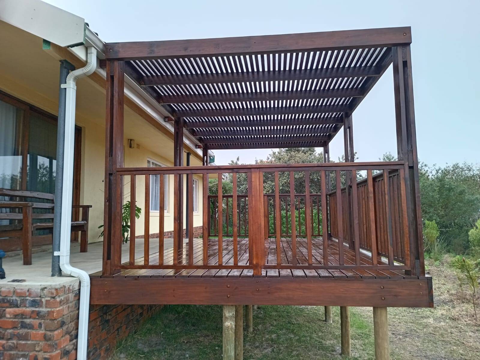 Large pergola with railing